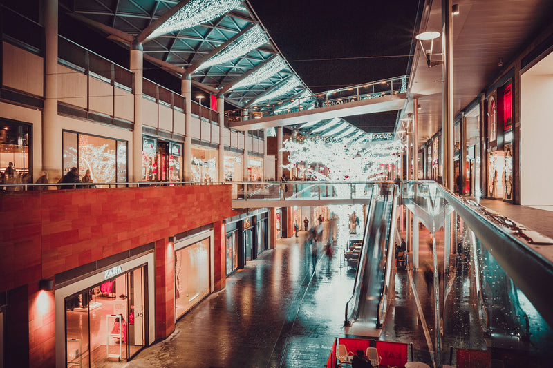 Escalators inside an empty shopping mall
